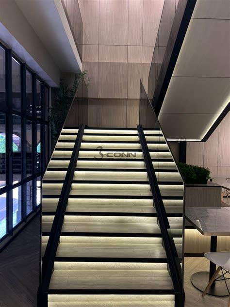 Mild Steel Staircase Structure With Glass Handrail And Titanium Topping