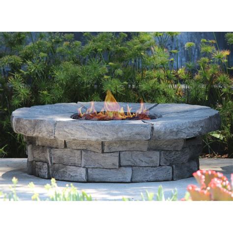 This fire pit table is by no means cheap, but it's much more. LivingSourceInternational Aurora Concrete Propane/Natural ...