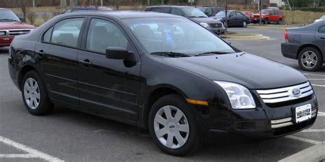 Ford Fusion Driver Runs Straight Into Stationary Pole While Turning Video