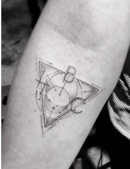 Fine Line Style Triangle Tattoo On The Right Forearm