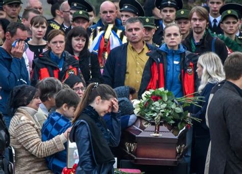 Crimea Mourns School Massacre Victims At Tearful Funeral