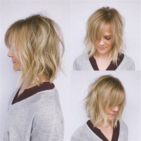Layers keep hair from being too heavy, which is essential for medium length and long tresses. Undone Wavy Textured Bob with Parted Side-Swept Bangs and ...