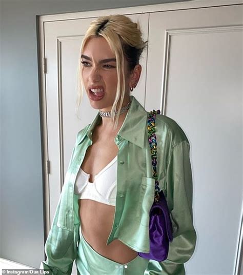 Dua Lipa Flaunts Her Chiseled Abs And Flashes Her Bra In A Mint Green
