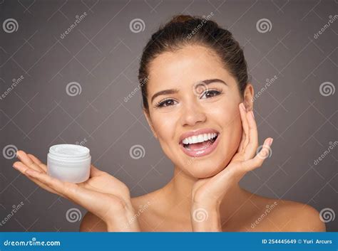 Enhance Your Natural Assets With Great Skincare Portrait Of A Beautiful Young Model Holding Up