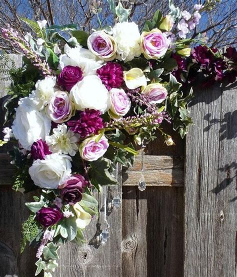 To make our arch we picked up a total of 3 pieces of 2 x 4 x 12ft pieces pressure treated wood and one 2 x 4 by 8ft piece. Wedding Arbor Flowers, Arch Corner Swags, wedding ...