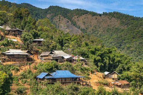 Remote Village Of Eng Tribe In Mountains Near Kengtung Myanmar Stock Photo