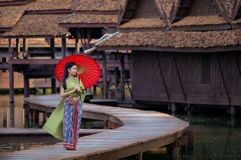 Premium Photo Thai Girl In Traditional Dress Costume Red Umbrella