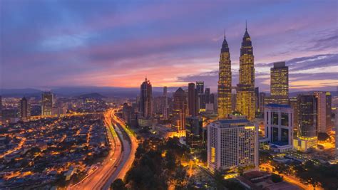 Visitors can take in the view from the deck on the bridge, which joins the towers on. Aerial View of Kuala Lumpur Stock Footage Video (100% ...