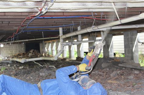 They stop water vapour from inside your home condensing inside the insulation where it will reduce the efficiency of the insulation and potentially lead to future problems. Contractor installing spray foam insulation in a crawlspace