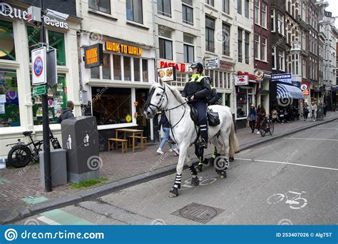 amsterdam netherlands mounted police patrol officers patrol in the center of amsterdam 2021 05