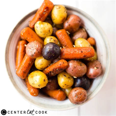 9 to 10 pounds), 1/4 cup mixed peppercorns (pink, white, and green), 3 tablespoons plus 2 1/2 teaspoons kosher salt, divided, 2 tablespoons chopped fresh thyme, 2 tablespoons chopped fresh rosemary. Garlic Roasted Potatoes and Carrots Recipe