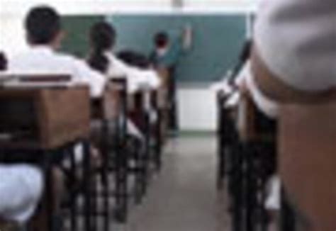 Teacher Caught On Cell Phone Caning Students