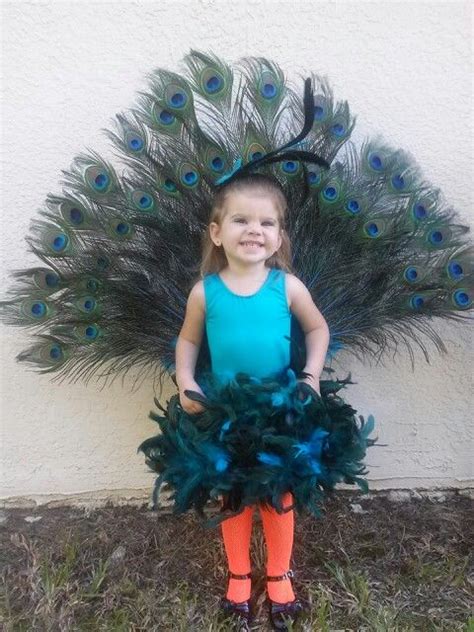 Peacock Costume The Tail Was Made Using About 50 Peacock Feathers Attached To A Peacock Fan