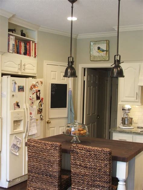 In plain english, it's gray and beige combined. Benjamin Moore coastal fog | Dining room paint colors ...