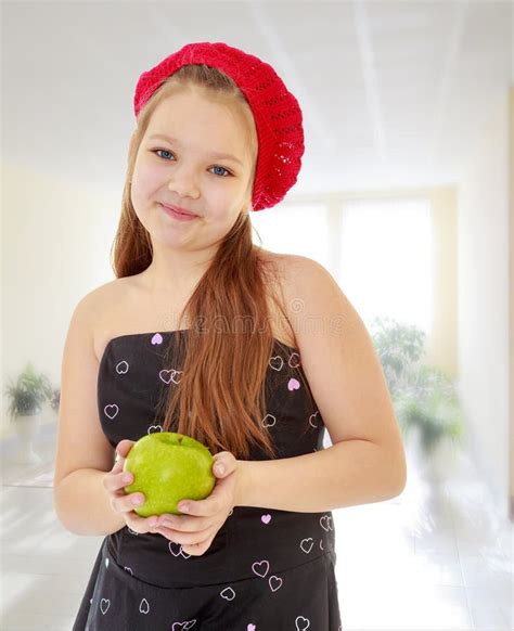 Teenager Girl Holding A Apple Stock Photo Image Of Children