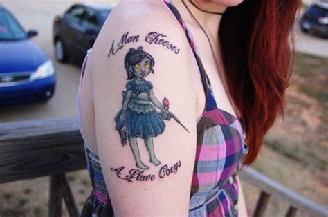 a woman chooses this awesome bioshock tattoo bioshock tattoo tattoos bioshock