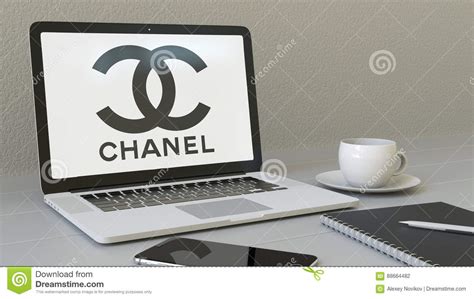 Laptop With Chanel Logo On The Screen Modern Workplace Conceptual