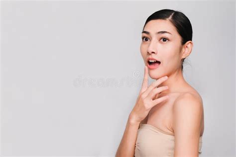 Young Beautiful Asian Woman With Clean Fresh Skin Hands Touch On The