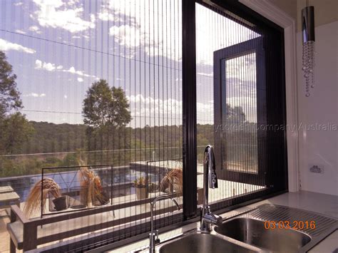 Using a traditional sliding window or sashless window limits the area of accessibility as glass panels do not fold away. Retractable screens kitchen servery windows | Windows ...
