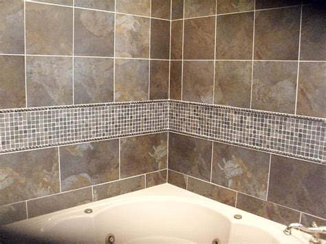 In my case, i had a small wall of tile between the tub surround and the actual tub so i was able to put 4 nails down each board on the long runs in between grout lines, in addition to the liquid nails which i used a caulk gun to apply the liquid nails prior to application. Tile Tub Surround | Tile Tub Surround, Shower, & Vanity ...