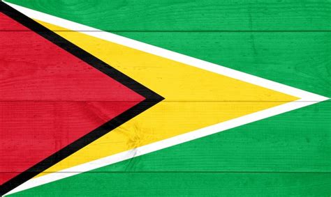 Bandera De Guyana Sobre Fondo De Madera Foto Premium