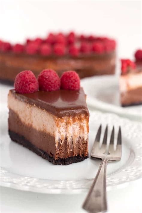 Garnish with white chocolate curls if desired. Chocolate Raspberry Cheesecake | i am baker