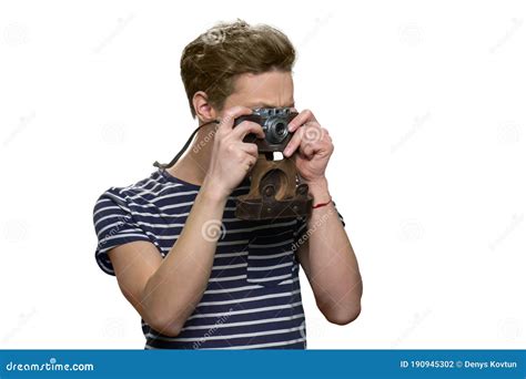 Boy Taking A Photo Using Retro Vintage Photo Camera Stock Photo