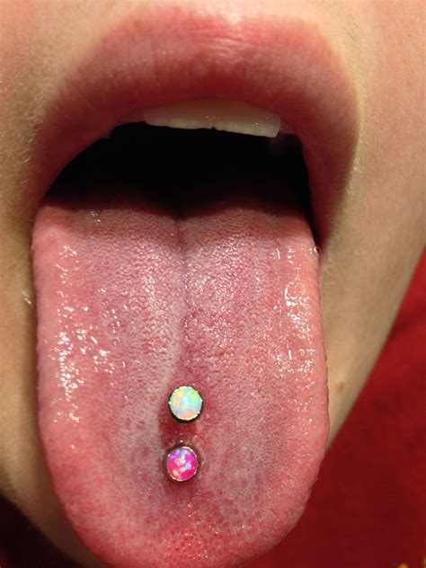 Double Tongue Piercing With Opals From Industrial Strength