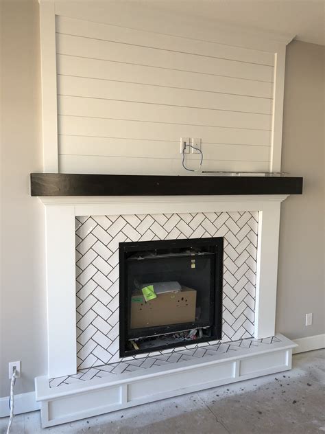Fireplace Surround With Shiplap Accent Above Stained Mantel Drees