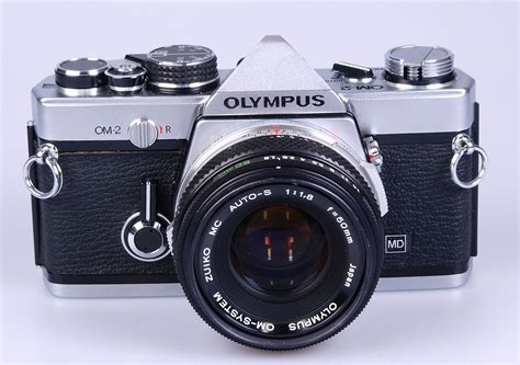 Olympus OM-2 chrome with Zuiko 50mm F1.8 lens. nice and clean set ...