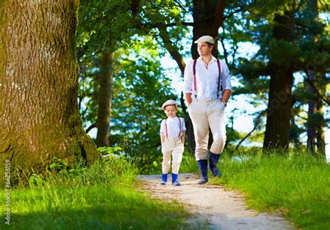 Father And Son Walking The Forest Path Stockfotos Und Lizenzfreie