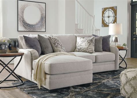 Besides furniture it has decor and pillows, lighting, bedding and mattresses etc. DELLARA CHALK SECTIONAL SIGNATURE DESIGN BY ASHLEY PRODUCT ...