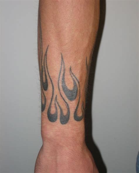 Small Flame Tattoo On Wrist Fire Tattoo Flame Tattoos Forearm Tattoos