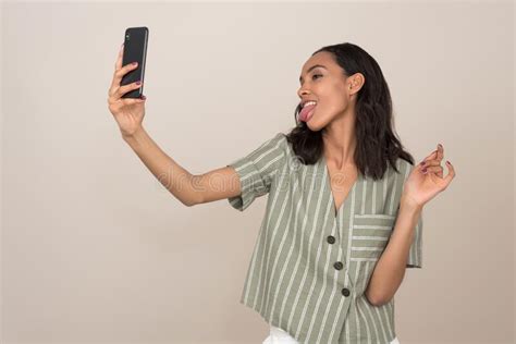 Young Attractive Girl Taking A Selfie With Her Tongue Out Stock Image Image Of Catchy Enjoy