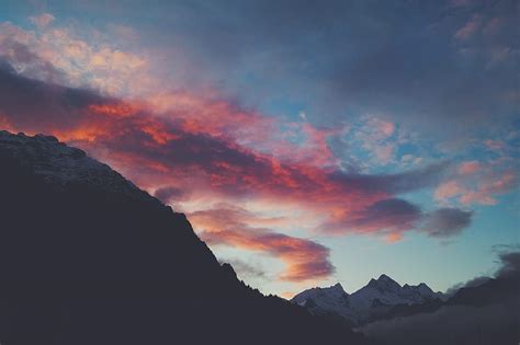 Snow Capped Mountain Under Red Clouds And Blue Sky Hd Wallpaper Peakpx