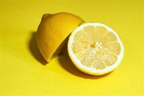 Close Up Photography Of Sliced Lemon · Free Stock Photo