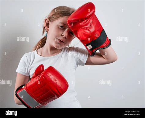 Little Girl In Boxing Gloves On White Background Stock Photo Alamy