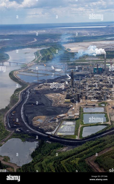 Tar Sands Refinery Tailing Ponds And Athabasca River Fort Mcmurray