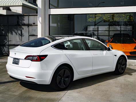 New car prices paid include dealer discounts for the same typically equipped vehicle (year, make, model, trim) and do not include taxes, fees (title, registration, license, document and transportation fees), manufacturer incentives and rebates. 2020 Tesla Model 3 Standard Range Plus Stock # 645071 for ...