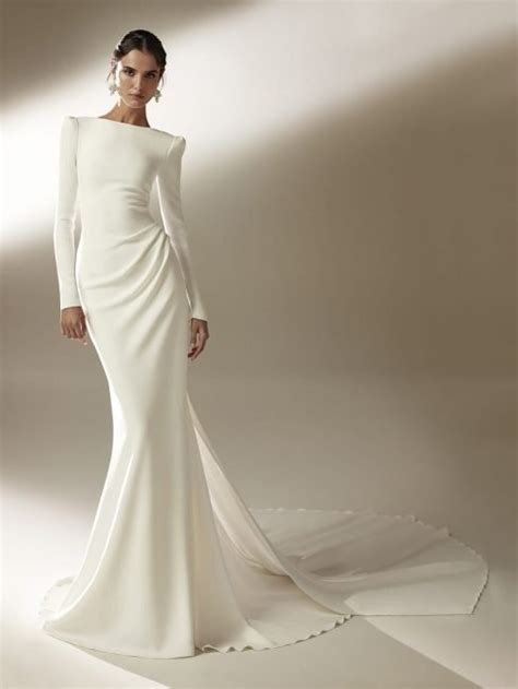 Pronovias presenta dancing lights, la collezione cruise 2020 di abiti da sposa. Abiti da Sposa a Sirena con Maniche Lunghe 2021: Pronovias