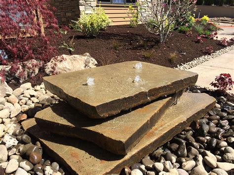 Natural Slab Stone Drilled And Plumbed In For A Naturalistic Garden