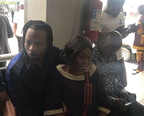 Naira Marley Poses In Court With His Mother Photos