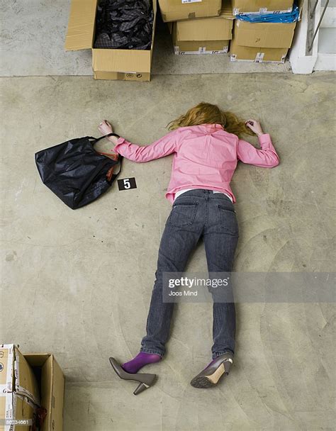 Woman Lying Face Down On Storeroom Floor Murdered Photo Getty Images