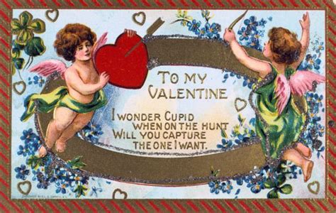 Two Cupid Angels Holding A Heart With The Words To My Valentine Written
