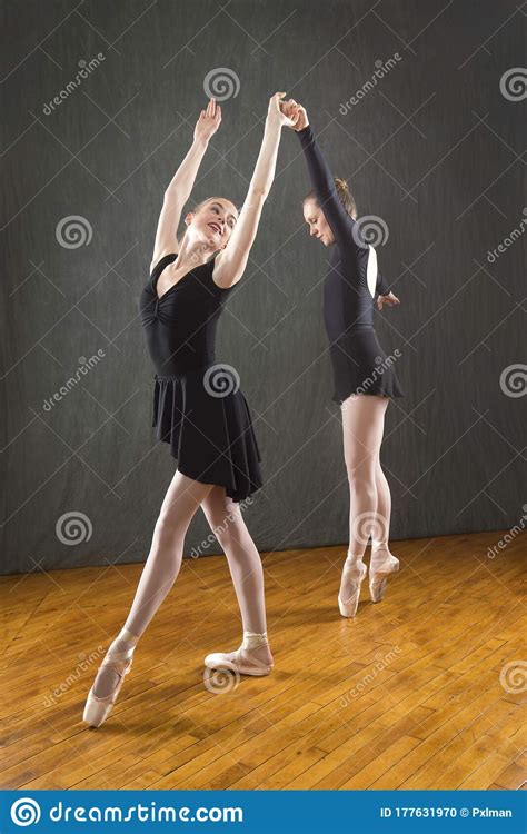 Two Young Woman Ballet Dancers In A Studio Photo Session Stock Photo