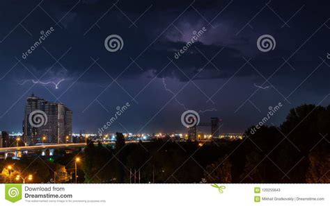 Thunder Lighting And Storm In Dark Night Sky Above City