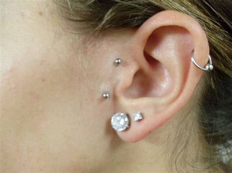 A tragus piercing is a piercing done on the tiny bump of cartilage that partially protrudes and a variation of this piercing is the surface tragus. surface tragus piercing. | Beauty, Style etc. | Pinterest