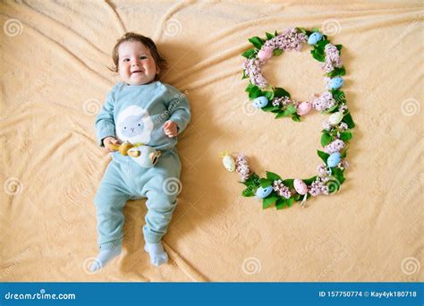 9 Months Old Baby Happy Nine Months Old Baby Crawling On Carpet At