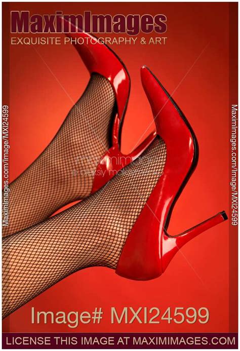 Photo Of Woman Legs In Red High Heel Shoes Up In The Air Stock Image