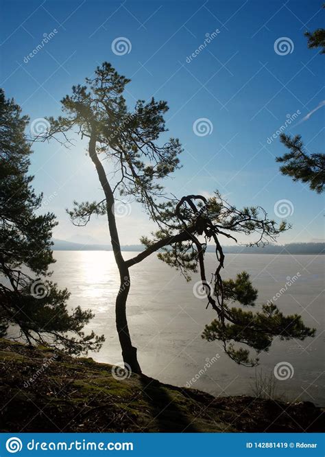 Beauty Sunrise Sky Over Frozen Water Lake Between Hills Stock Image